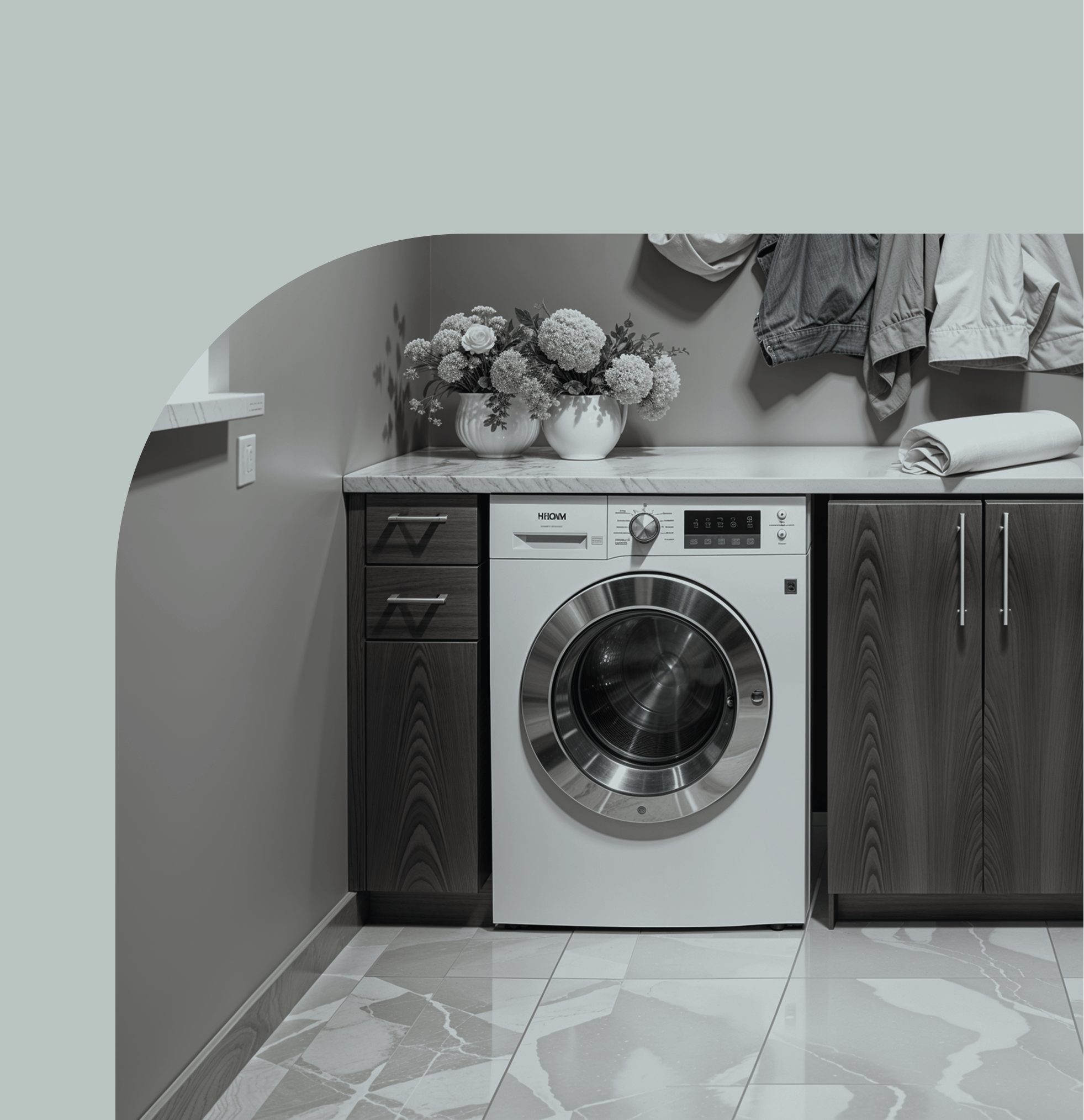 A side-by-side washer and dryer in a home laundry closet