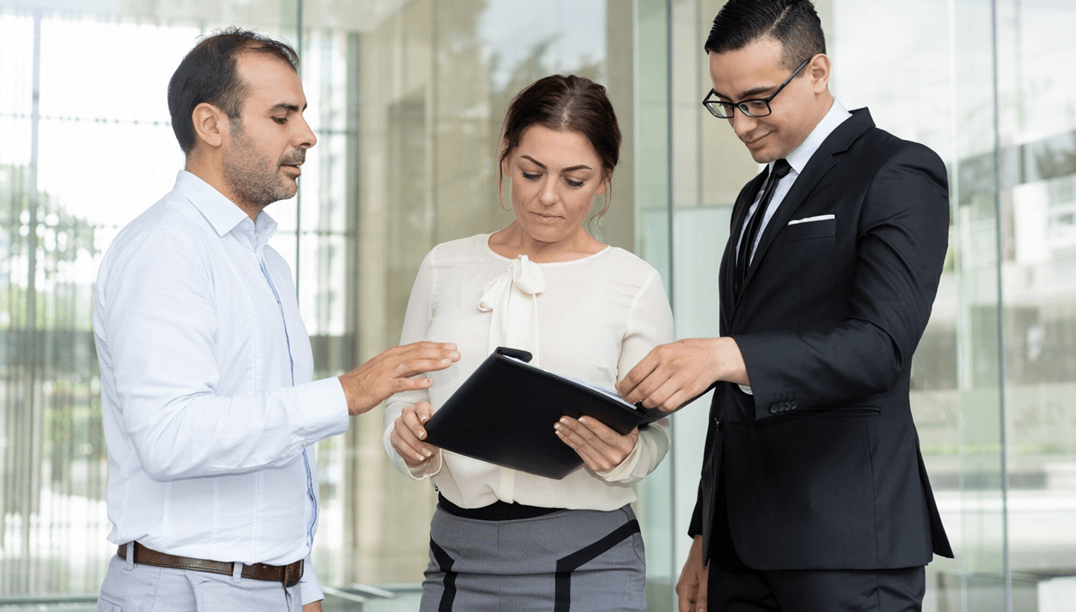 Executives reviewing strategy together