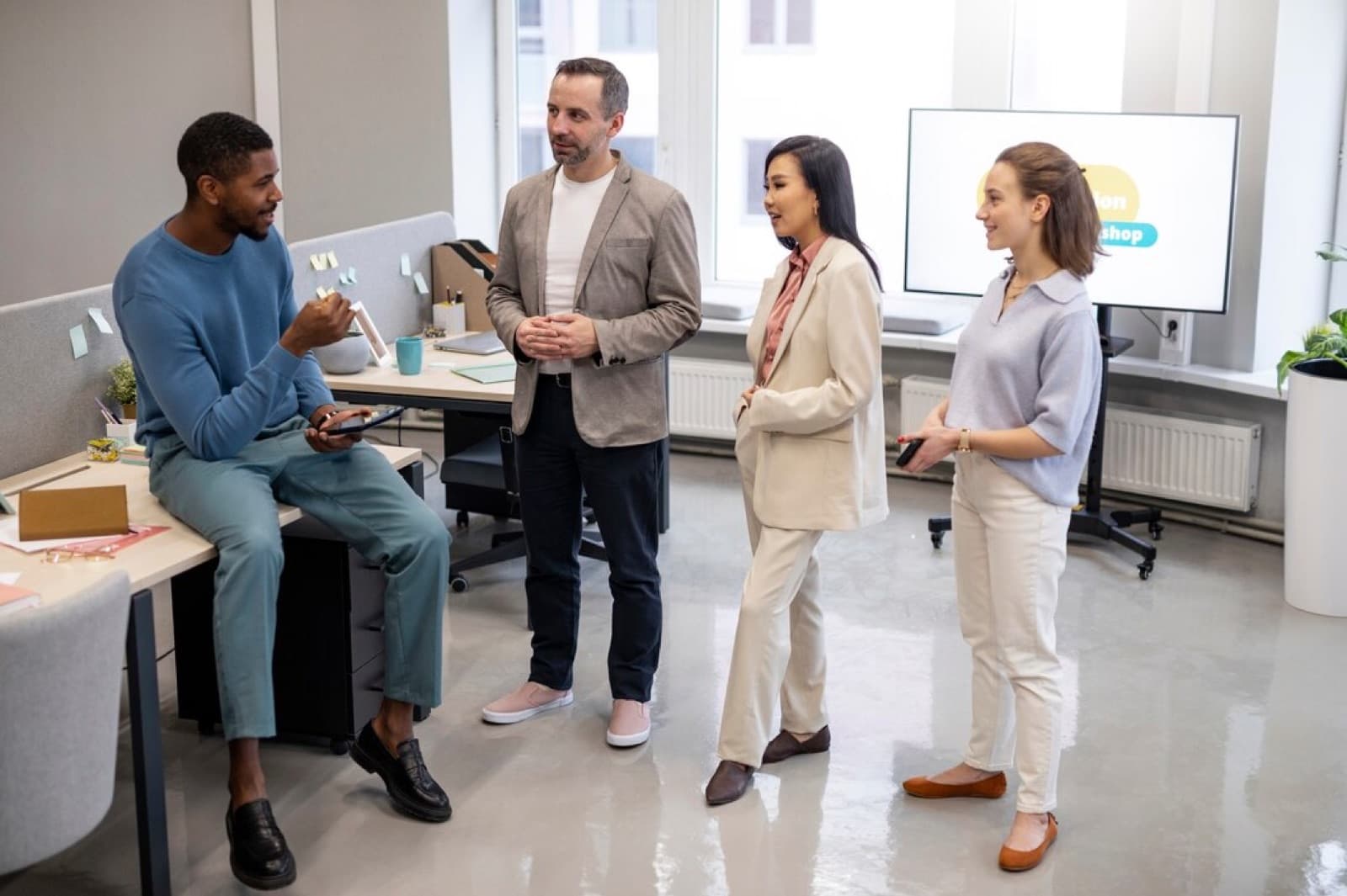 A property team aligned and talking in an office