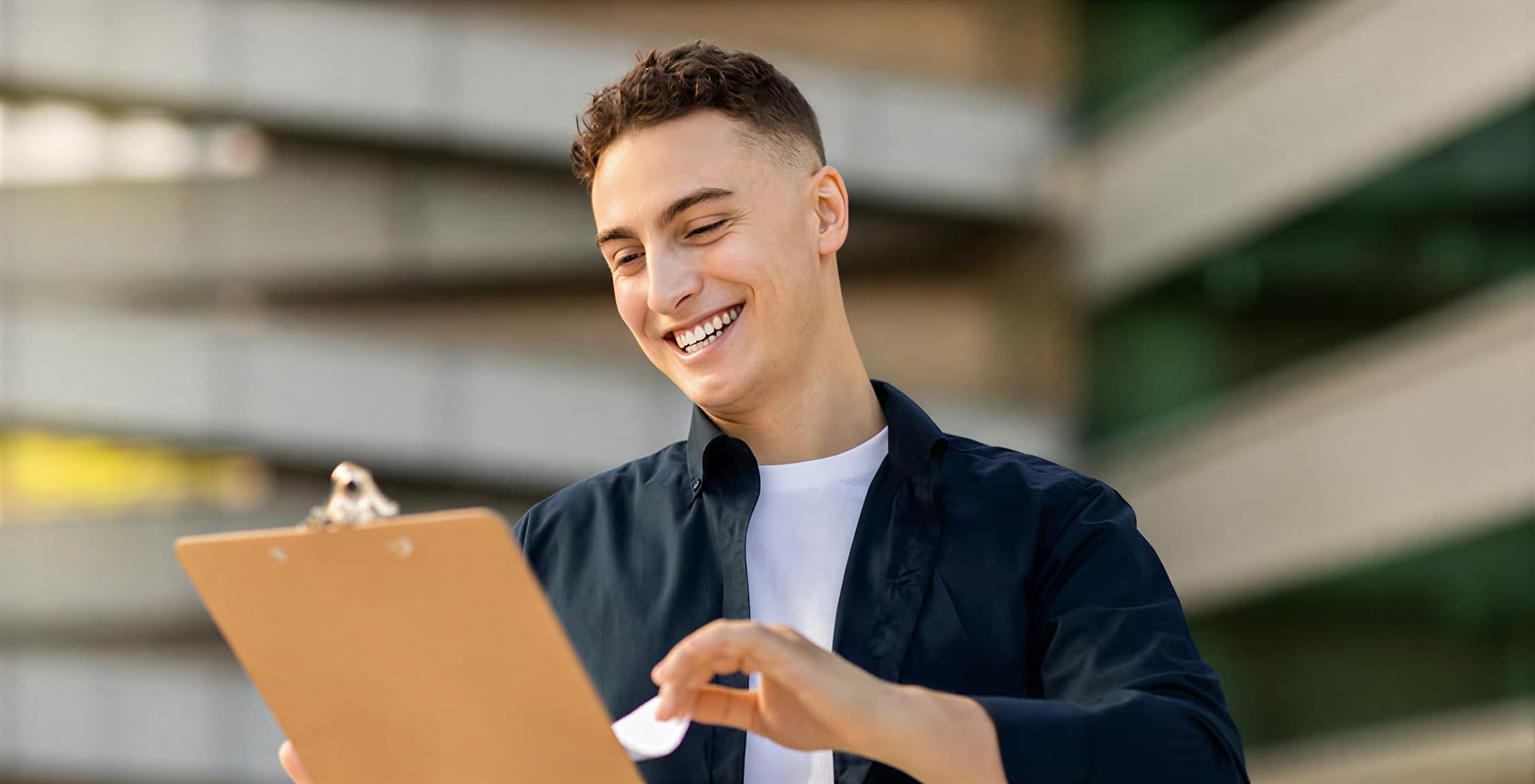 A partner checking off items on a clipboard